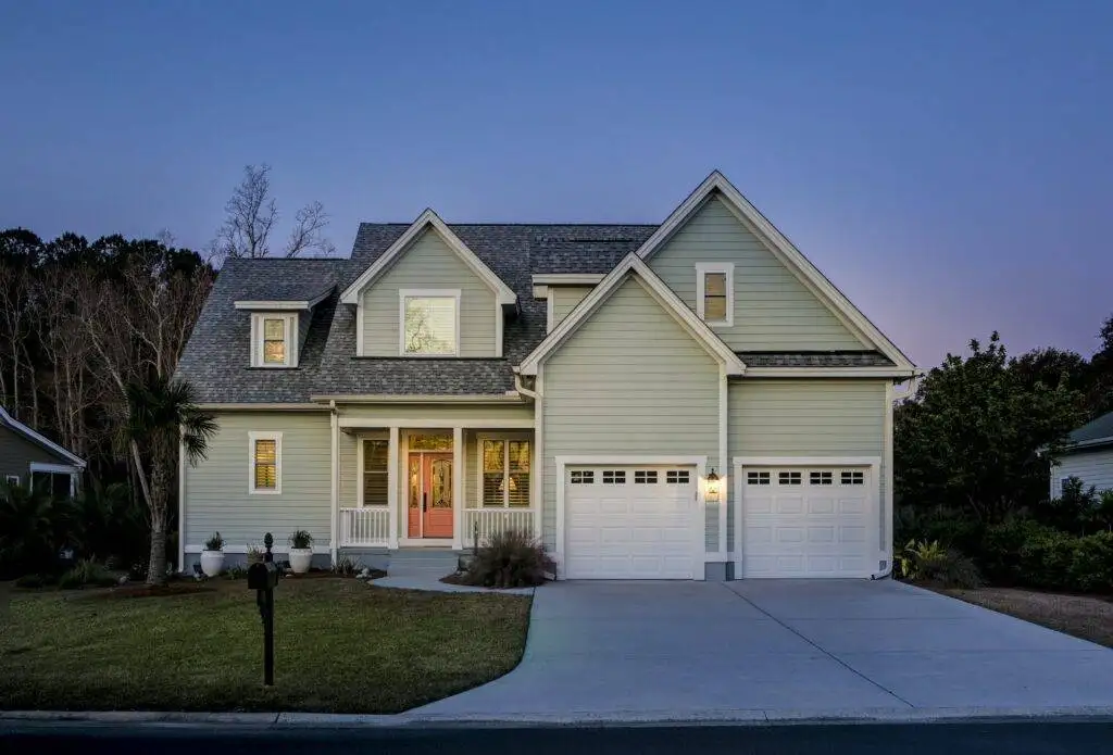 front elevation of beautiful home lit up at twilight 1024x695 1